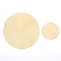 Close-up of beige woven round placemats showing detailed spiral texture and heat resistance - Beige