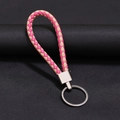 Portachiavi in pelle intrecciata rosa e beige con anello metallico argento e chiusura - 30*1.6mm / Rosa Cachi