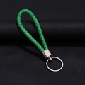 Portachiavi in pelle intrecciata verde con anello in metallo argento e chiusura scura - 30*1.6mm / Verde