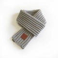 Short grey knitted scarf with vertical ribbed texture and brown leather label accent - Gray / 100-135