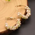 Handmade gold hoop earrings featuring white pearls and light green natural stones - Fruit Green Style