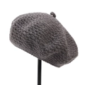 Detail of dark grey hand-crocheted wool beret showing thick knitted texture and top stem - M (56-58cm) / Dark Gray