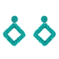 Detailed view of turquoise handmade seed bead woven geometric rhombus drop earrings - Green