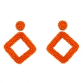 Detailed view of handmade bohemian geometric diamond-shaped orange beaded dangle earrings - Orange