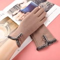 Brown thermal gloves for women with faux fur trim and decorative buttons on pink background - Khaki Fur Cuff With Three Buttons