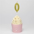 Golden number 0 birthday candle with metallic finish on a pink cupcake - Number 0