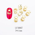 Detail view of 7x11mm golden crown nail art charms with three pearls and alloy finish - Crown Shape (LF3007) / 1 Piece