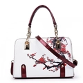 White floral tote bag with red plum blossom print and patent leather trim details - White Plum