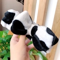 Detail of plush cow print headband with soft texture and cute bow tie for skin care - 3# Black & White Cow Print