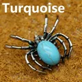 Gothic spider brooch pendant featuring a turquoise stone in an antique silver finish - Turquoise