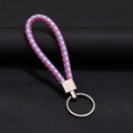 Portachiavi intrecciato in pelle rosa e blu con anello in metallo su sfondo nero - 30*1.6mm / Rosa Celeste