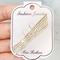 Pince à cheveux dorée ornée de strass pavés et d'une perle blanche élégante - A7-25