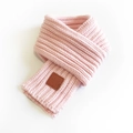 Pink knit scarf for women with ribbed texture and brown leather label on white background - Pink / 100-135