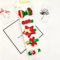 Detailed view of a 5-piece Christmas hair clip set with reindeer and holiday motifs - Bowknot 5-Piece Set