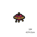Detailed embroidery of a UFO space patch showing vibrant pink and yellow threads - 18# UFO Patch