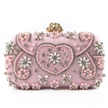 Exquisite pink satin clutch with handmade pearl heart pattern and gold flower clasp - Pink