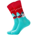Close-up of cotton Christmas socks with snowman and gift patterns in red and teal - Snowman