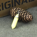 Hexagonal yellow quartz crystal point pendant with silver bail on rustic wood background - Yellow Jade
