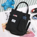 Versatile black canvas crossbody bag with multiple pockets and adjustable strap for students - Multi-use Water Cup Position / Black