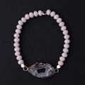 Pink faceted crystal beaded bracelet with gold edged druzy agate stone on black background - Pink Geode/Pink Beads