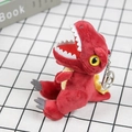 Gros plan d'un petit porte-clés dinosaure en peluche rouge avec des nageoires jaunes - 14 cm (avec chaîne de perles) / Rouge