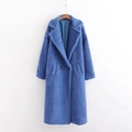 Detailed view of royal blue faux fur coat featuring notched lapels and button closure - S / Tops / Blue