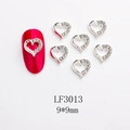 Detailed view of silver heart crown nail charms with rhinestones on red nails - Heart Shape (LF3013) / 1 Piece