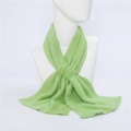 Soft light green knitted scarf for women and men featuring fringe and plush texture - Green