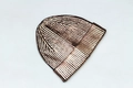 Macro shot of metallic bronze knitted beanie showing detailed texture and reflective finish - Rose Gold