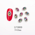 Macro view of LF3089 aurora K9 crystal nail charm with pavé white rhinestones, 7x10mm - 3089 Aurora AB Oval (LF3089)