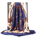Detailed view of navy satin scarf featuring classic equestrian chain and stirrup patterns - Navy Blue