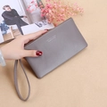 Gray long women's zip wallet with pebbled leather texture and wrist strap - Gray