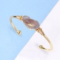 Handmade copper wire wrapped gold open bangle featuring an irregular druzy agate stone - Light Purple