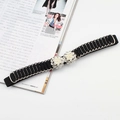Detail of black elastic waist belt featuring a pearl and rhinestone flower buckle - Round Pearl Rhinestone Buckle (Silver)