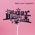 Black glitter Happy Birthday cake topper with stars on a pink background, 13.2cm wide - HB To You Black