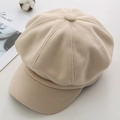 Close-up of beige wool octagonal newsboy hat with soft texture for autumn fashion - M / Beige