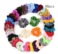 Flat lay of 40pcs velvet hair scrunchies in assorted colors arranged in a circle - 40-Piece Color Set