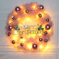 Ghirlanda natalizia rosa con decorazioni viola d'argento e luci LED su parete bianca - 30cm / Rosa con Decorazioni LED