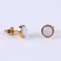 Elegant gold earrings with white round cabochon stones and cubic zirconia accents - Opal