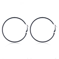 Close-up of deep blue oversized hoop earrings with secure hinged clasp design - Black