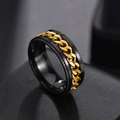 Macro shot of black titanium spinner ring with gold chain detail for stress relief - US 8 / Black & Gold