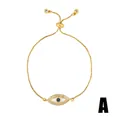 Dettaglio del bracciale occhio del diavolo dorato con opale blu e pietre di zircone - Stile Occhio con Ciglia Raggianti