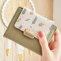 Olive green and cream PU leather wallet with leaf print and gold buckle detail - Green
