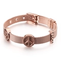 Pulsera de malla de acero inoxidable oro rosa con dijes de corazón y paloma en fondo blanco - Oro rosa