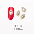 Close-up of K9 crystal drop nail charms with gold plating and LF3112 numbering - 3112 Crystal AB Gold Base Teardrop (LF3112)
