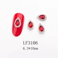 Macro view of LF3106 6.3x10mm red teardrop crystal nail art gems with silver base - 3106 Bright Red Silver Base Teardrop (LF3106)