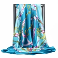 Classic blue silk square scarf with gold equestrian chain and bit print on white rack - Petrol Green