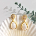 Elegant gold teardrop earrings with white mother of pearl and shimmering zircon stones - Gold + White