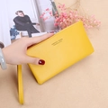 Chic bright yellow long wallet with litchi grain leather texture and hand strap - Yellow