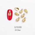 Detailed close-up of 6x10mm gold U-shaped nail charms with inlaid crystal and pearls - Gold Full Rhinestone U-Shape Style (3195) / 10 Pieces Pack